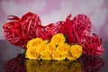 Red wicker hearts on a black background for a Valentine`s day Royalty Free Stock Photo