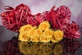 Red wicker hearts on a black background for a Valentine`s day Royalty Free Stock Photo