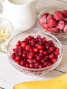 Red wild frozen cranberries with raspberries and banana