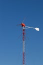 Red windmill generates electricity