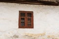 Red window on old traditional Transylvanian log house Royalty Free Stock Photo