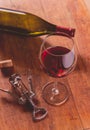 Red wine against wooden background Royalty Free Stock Photo