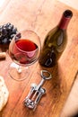 Red wine against wooden background Royalty Free Stock Photo