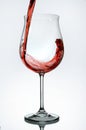 Red wine being poured into a wine glass Royalty Free Stock Photo