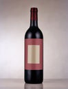 Red wine bottle from Bordeaux with blank label sticker