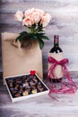 Wine, chocolates and roses