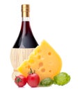 Red wine bottle, cheese and tomato still life Royalty Free Stock Photo