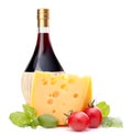 Red wine bottle, cheese and tomato still life Royalty Free Stock Photo