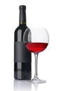 Red wine bottle with empty black label and glass for tasting Royalty Free Stock Photo