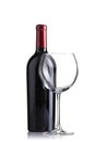 Red wine bottle and an empty glass Royalty Free Stock Photo