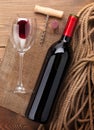 Red wine bottle, glass, cork and corkscrew. View from above Royalty Free Stock Photo