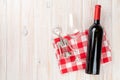 Red wine bottle, glass and corkscrew Royalty Free Stock Photo