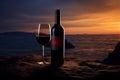 Red Wine Bottle on Ocean Beach, Wine Bottle Mockup on Rocky Shore, Dark Blue Sky Sunset Royalty Free Stock Photo