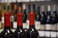 Red wine bottles in wine store Royalty Free Stock Photo
