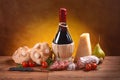 Red wine, bread, cheese and salami Royalty Free Stock Photo