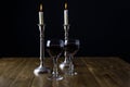 Red Wine with candles on wood table Royalty Free Stock Photo