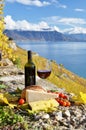 Red wine, cheese, bread and cherry tomatoes Royalty Free Stock Photo