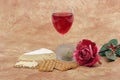 Red wine, cheese, crackers and rose