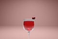 Red wine with cherry in rose gold background