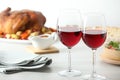 Red wine and delicious dinner served on light table Royalty Free Stock Photo
