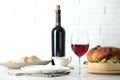 Red wine and delicious dinner served on light table Royalty Free Stock Photo
