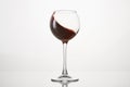 Red wine diagonal wave, curl is in stemmed glass.