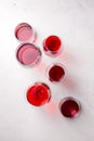 Red wine in different glasses, top view