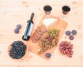 Red wine,  figs, cheese, grape and bread on wooden table. Top view Royalty Free Stock Photo