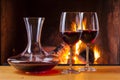 Red wine at fireplace with decanter