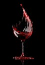 Red wine glass on black background Royalty Free Stock Photo
