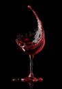 Red wine glass on black background Royalty Free Stock Photo