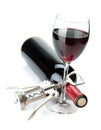 Red wine glass, bottle and corkscrew Royalty Free Stock Photo