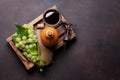 Red wine glass, bottle and white grape in wooden box Royalty Free Stock Photo