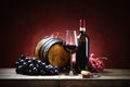 Red wine glass with bunches of grapes, bottle and small barrel in vintage setting. Royalty Free Stock Photo