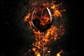 Red wine glass in fire Royalty Free Stock Photo