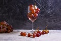 Red wine glass, beverage concept grapes alcohol celebrate winery design on concrete background decorative natural Royalty Free Stock Photo