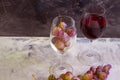 Red wine glass, grapes burgundy delicious design vintage restaurant tasty on concrete background