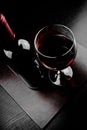 Red wine glass near bottle Royalty Free Stock Photo