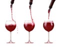 Red wine in glass pouring from bottle and make splash, dispenser on the bottle, red wine jet