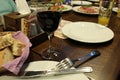 Red wine in a glass in a restaurant near a plate of bread on a dark background of the table. Restaurant cafe Royalty Free Stock Photo