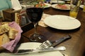 Red wine in a glass in a restaurant near a plate of bread on a dark background of the table. Restaurant cafe Royalty Free Stock Photo