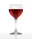 Red wine glass, on white surface and background, viewed from a side. Royalty Free Stock Photo