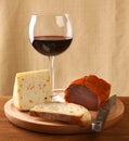 Red wine with italian cheese and capocollo Royalty Free Stock Photo