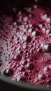 Red wine liquid surface bubbling during fermentation process Royalty Free Stock Photo