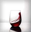 Red wine moving in glass