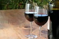 Red Wine on Outdoor Wooden Table Royalty Free Stock Photo