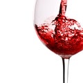 Red wine pour into glass Royalty Free Stock Photo