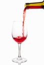 Red wine in a glass isolated on white background. Royalty Free Stock Photo