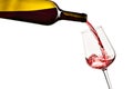 red wine pouring from bottle into glass on a white backgroundred wine pouring from bottle into glass on a white background