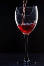 Red wine pouring Royalty Free Stock Photo